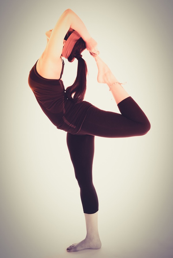 Doing yoga stretches can help reduce stress levels and help with New Yearâ€™s resolutions.