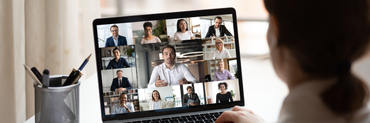 Business woman working remotely and having a conference video meeting with her coworkers
