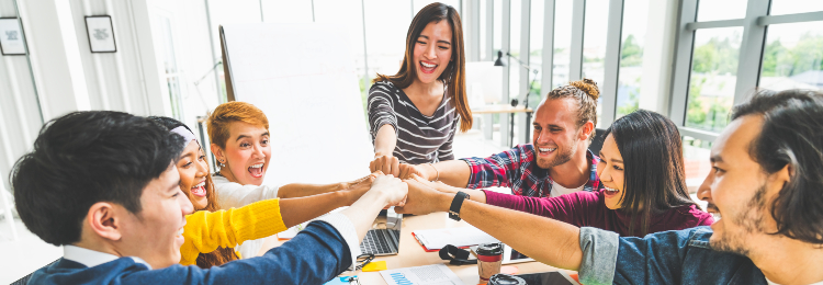 Multiethnic diverse group of office coworker fist pumping